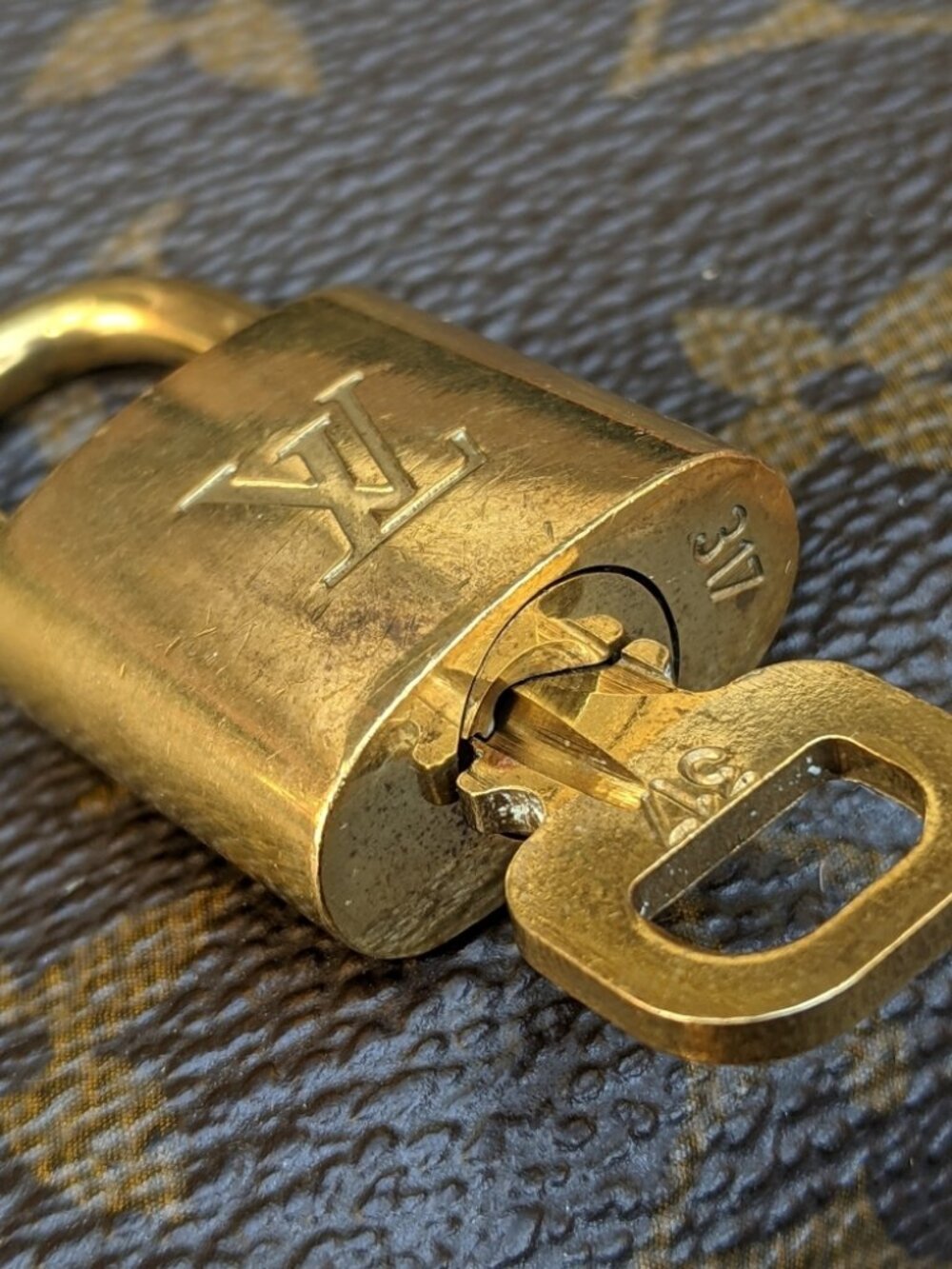 Authentic Louis Vuitton padlock key and lock set